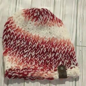 Handmade knitted red multicolored winter hat